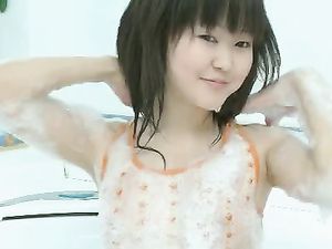 Adorable Asian In A Bubble Bath Masturbates